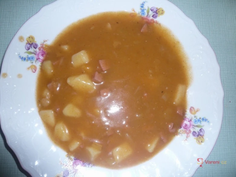 Hot Czech pork brain soup with potatoes in broth.