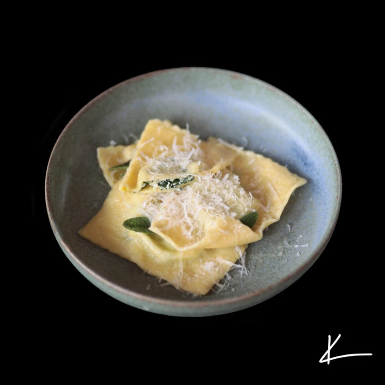 Ravioli with sage and cheese