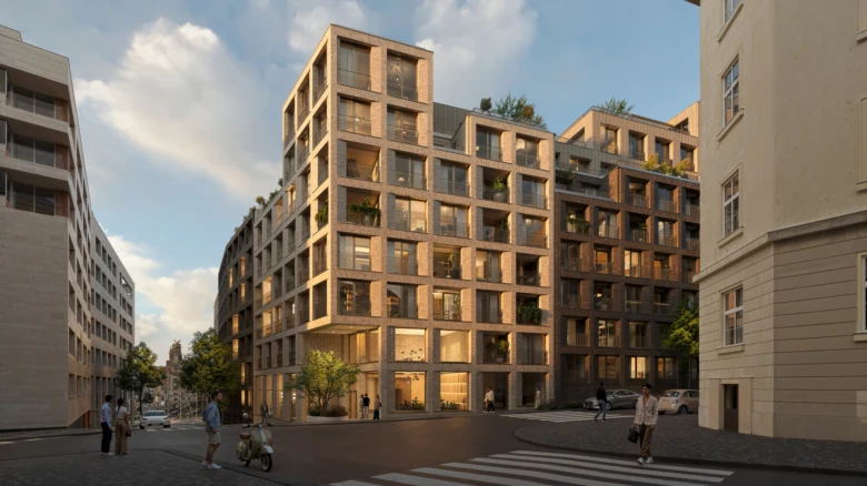 Moderní rezidenční komplex na Vinohradské ulici s balkony a zelení.
