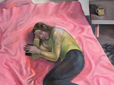 Person lying on bed